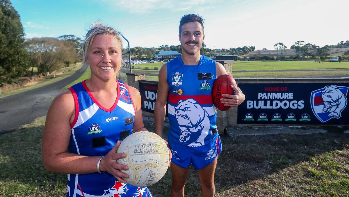 NEW THREADS: Panmure netball coach Stacy Dunkley and football captain Louis Kew show off the club's new netball dress and football jumper. Picture: Anthony Brady