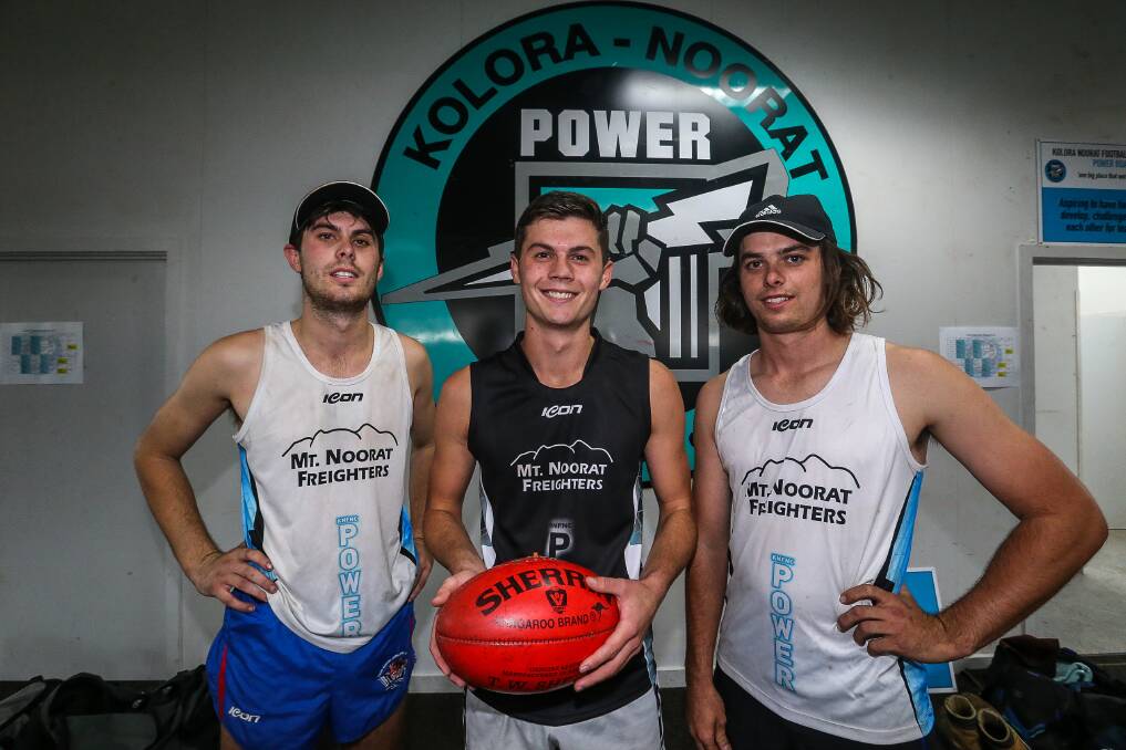 Power family: Kolora-Noorat's Joe O'Sullivan (left), here with brothers Harry and George, celebrated his 100th senior game with a monster win over Allansford. Picture: Anthony Brady