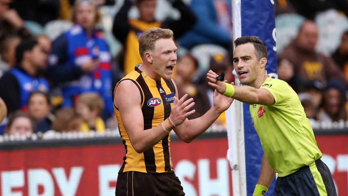 Drama: James Sicily gives away a free kick to Billy Gowers last term as the Bulldogs stormed to a come-from-behind win.