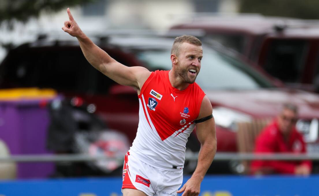 NEW COLOURS: South Warrnambool's Jesse Gallichan celebrates after kicking his first goal in red and white. He would finish with two goals in his Roosters debut. Picture: Morgan Hancock