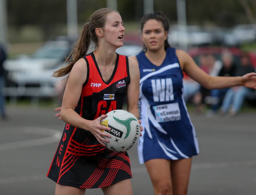 HARD TO STOP: Cobden's Jaymie Finch (pictured) was prolific in the goal circle in the Bombers' 71-34 win over Warrnambool on Saturday. She teamed with sister Emily to cause problems for the Blues. Picture: Anthony Brady