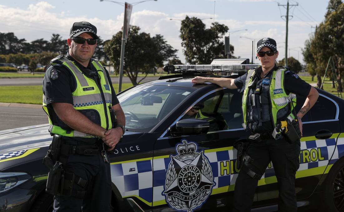 Warrnambool highway patrol's Senior Constable Corey Holland and Senior Constable Amy Morel are targeting mobile phone use by drivers. Picture: Rob Gunstone