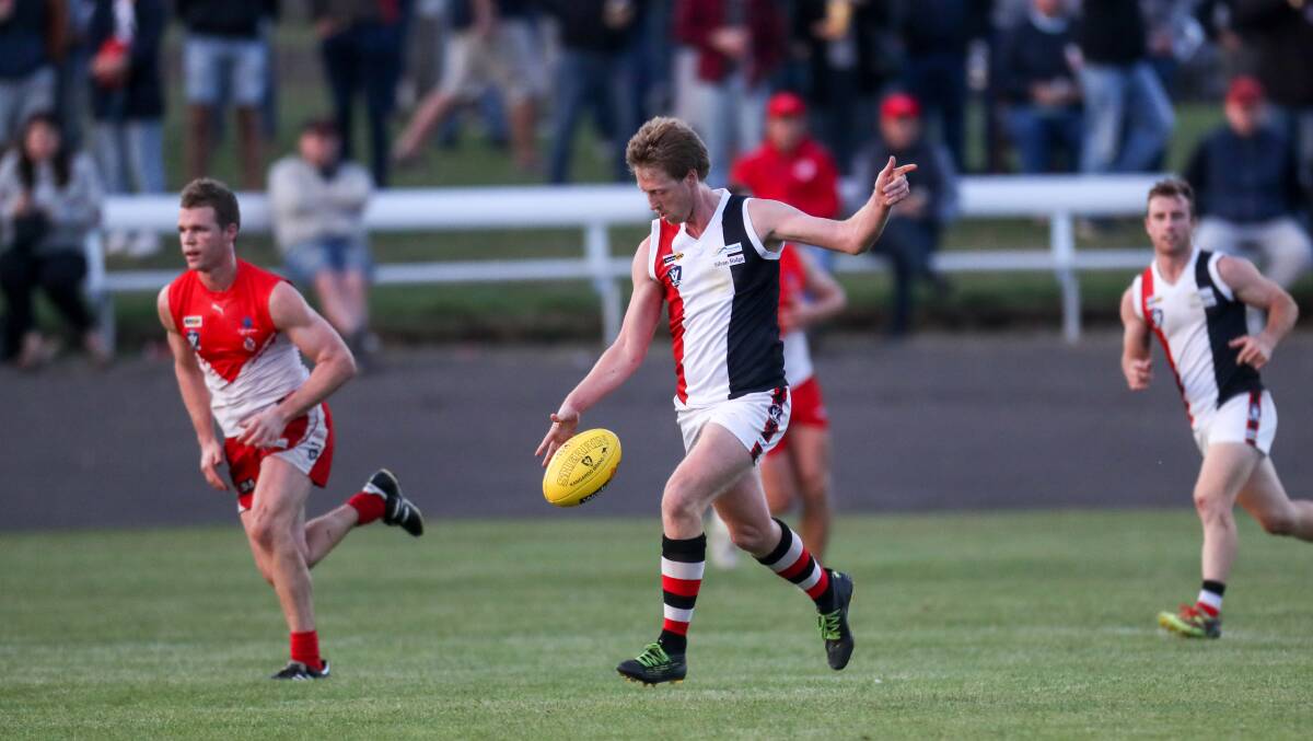 MRCHING FORWARD: Koroit's Dallas Mooney drives the ball out of defence. Picture: Rob Gunstone