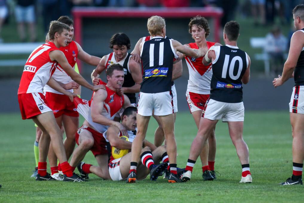 On tape: Tempers start to get heated in a 2019 South Warrnambool versus Koroit match. All Hampden senior football matches could be filmed next year to help the tribunal system. Picture: Rob Gunstone