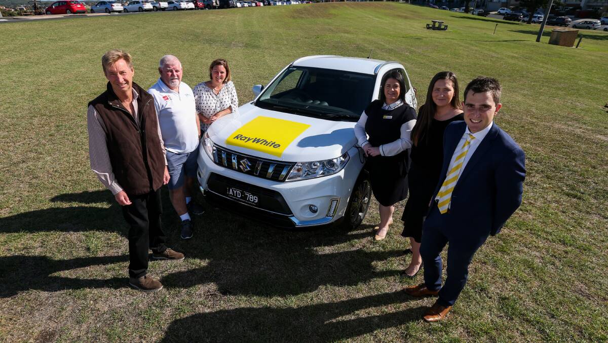 GREAT: Standing Tall's Ross Morey, Mike Toone and Pip Norton with Ray White Real Estate staff Hayley Shannon, Kate McDonald and Steve Aberline. Picture: Rob Gunstone
