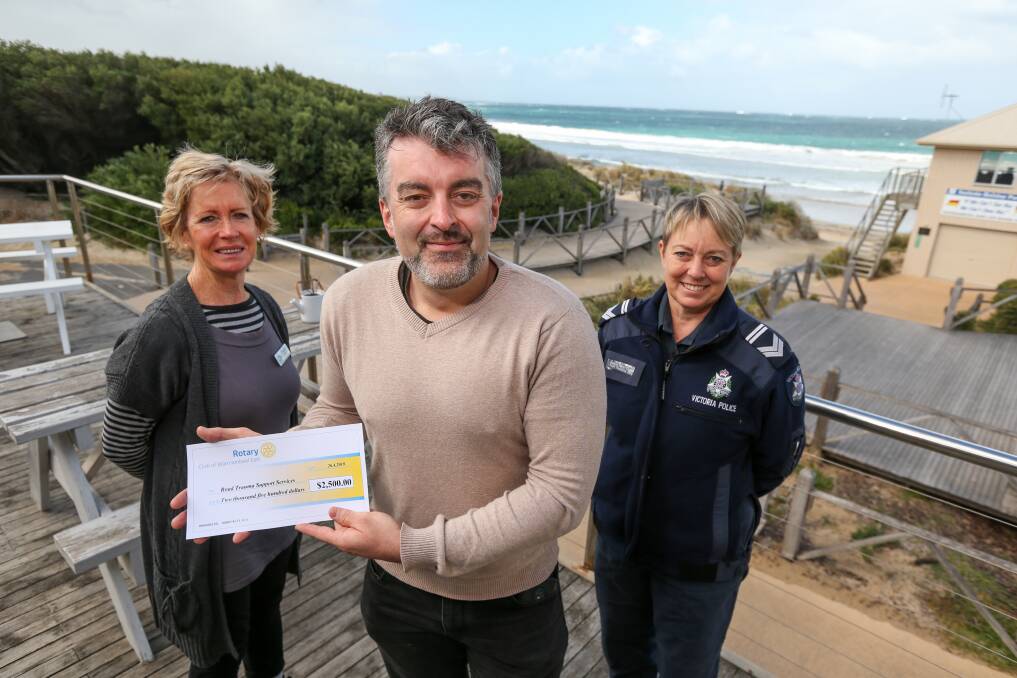 Extra funds: Warrnambool Club of Rotary East president Maggie Dwyer presents a cheque to Road Trauma Support Services of Victoria's Rhys Tate, with Leading Senior Constable Trudy Morland. Picture: Rob Gunstone