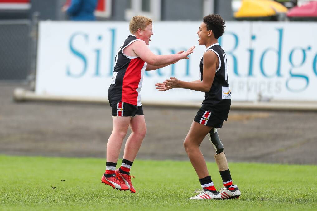 Footy: Liam Bell and Jaylen Brown celebrate a goal for Koroit's under 14s team this season. Picture: Morgan Hancock