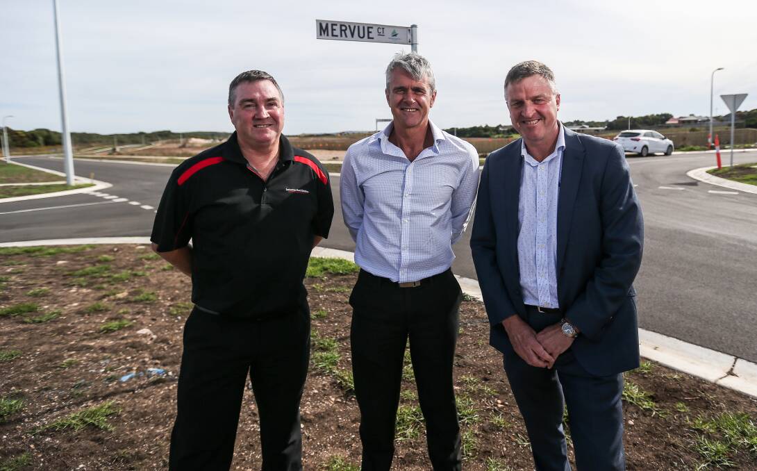 
KEPT BUSY: Real estate agents Mark Dwyer, Nigel Kol and Gary Attrill have been kept busy selling Mervue estate. Picture: Anthony Brady