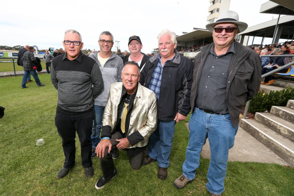 Brett Hansen, from Collie in WA, surrounded by his mates. He had to wear the gold 'Larry Loser' jacket because of his poor betting form. Picture: Rob Gunstone