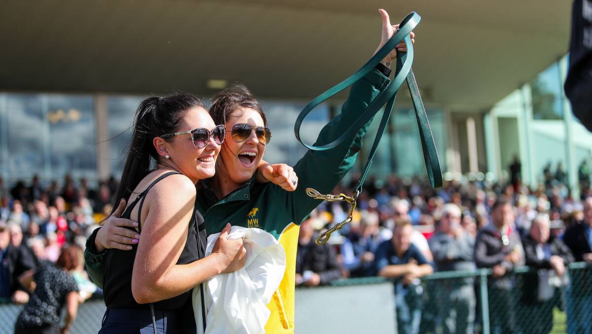 GOOD START: Amy Small and Sarah Woodhouse celebrate Harbour Views' win. Picture: Morgan Hancock