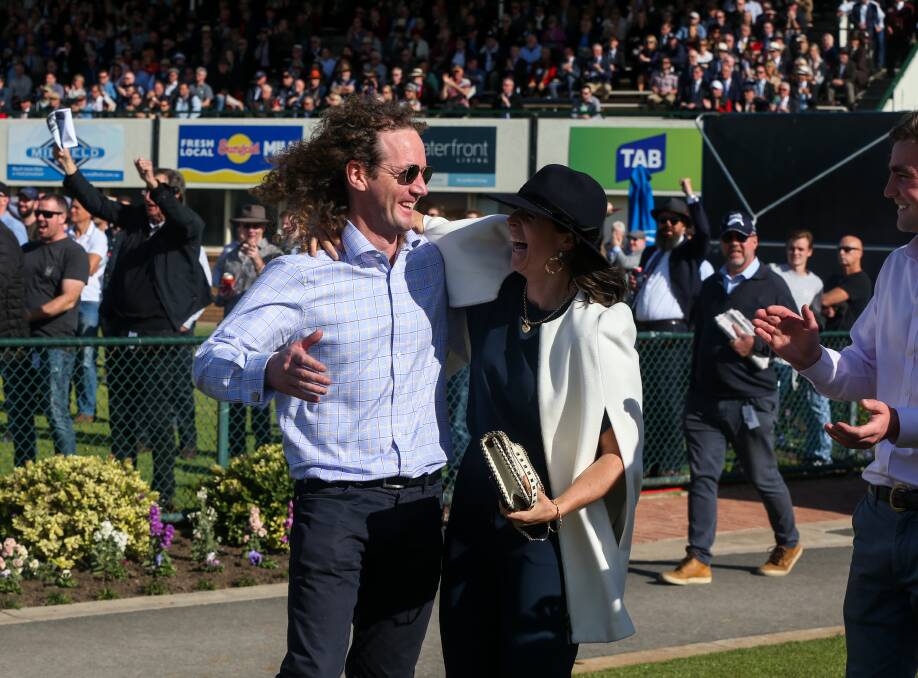 Winners: Trainer Ciaron Maher and assistant trainer Annabel Neasham celebrate Big Blue's Galleywood Hurdle win. Picture: Rob Gunstone