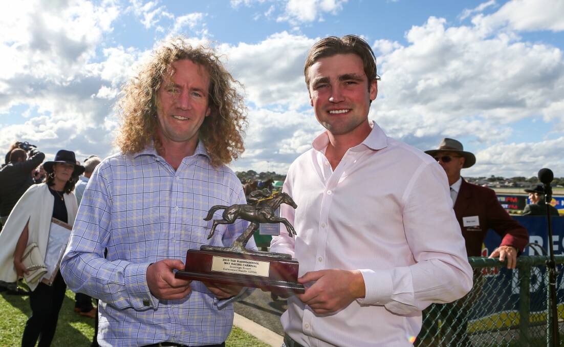 Strong team: Trainers Ciaron Maher and David Eustace with the Galleywood Hurdle trophy in 2019. They trained three winners to victory on Saturday. 