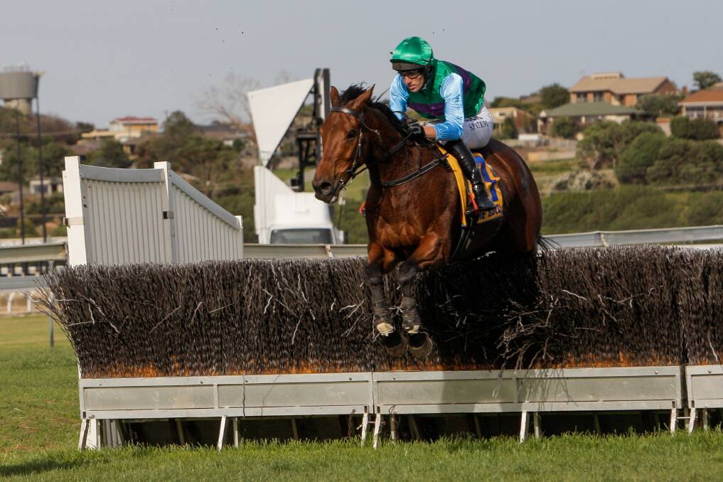 Bound for glory: Zed Em and Steven Pateman clear a jump in the Grand Annual. Picture: Rob Gunstone
