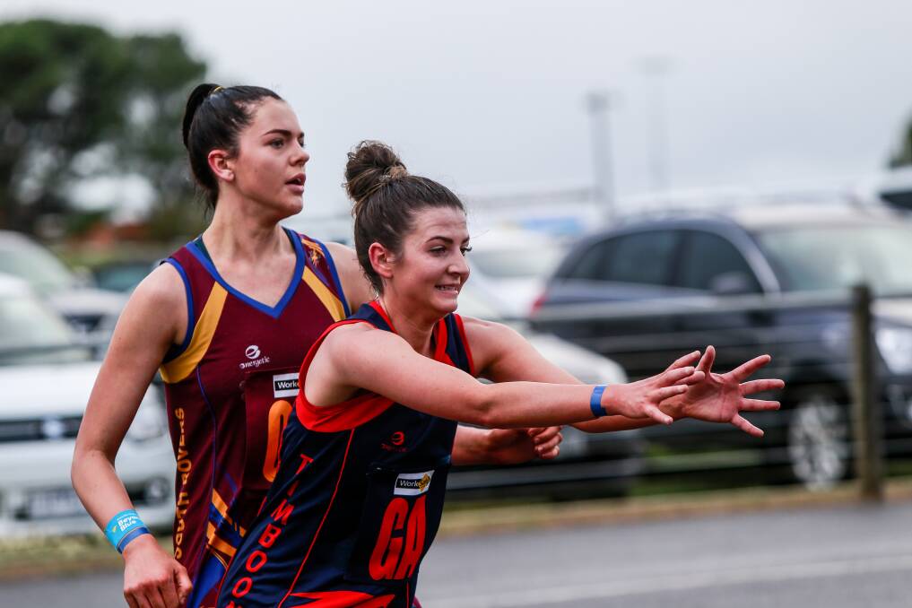 Instrumental: South Rovers playing-coach Jessica Rohan, here marking Timboon's Raina Hunt, had a major influence on her side's impressive 45-43 win over the Demons. Picture: Anthony Brady