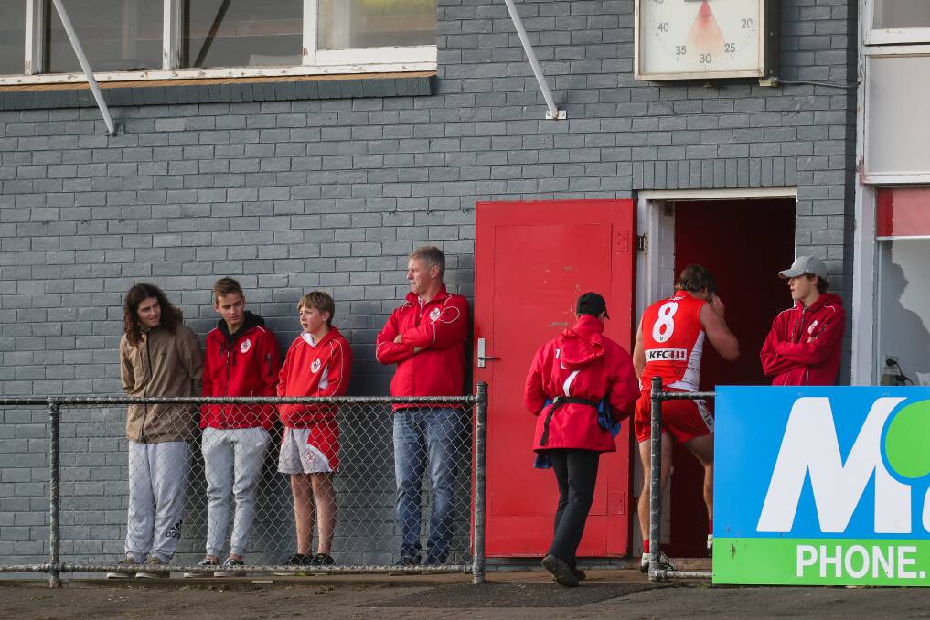 The moment: South Warrnambool's Liam Youl is taken into the rooms with an injury during the second quarter of his side's game against Cobden on Saturday. Picture: Morgan Hancock