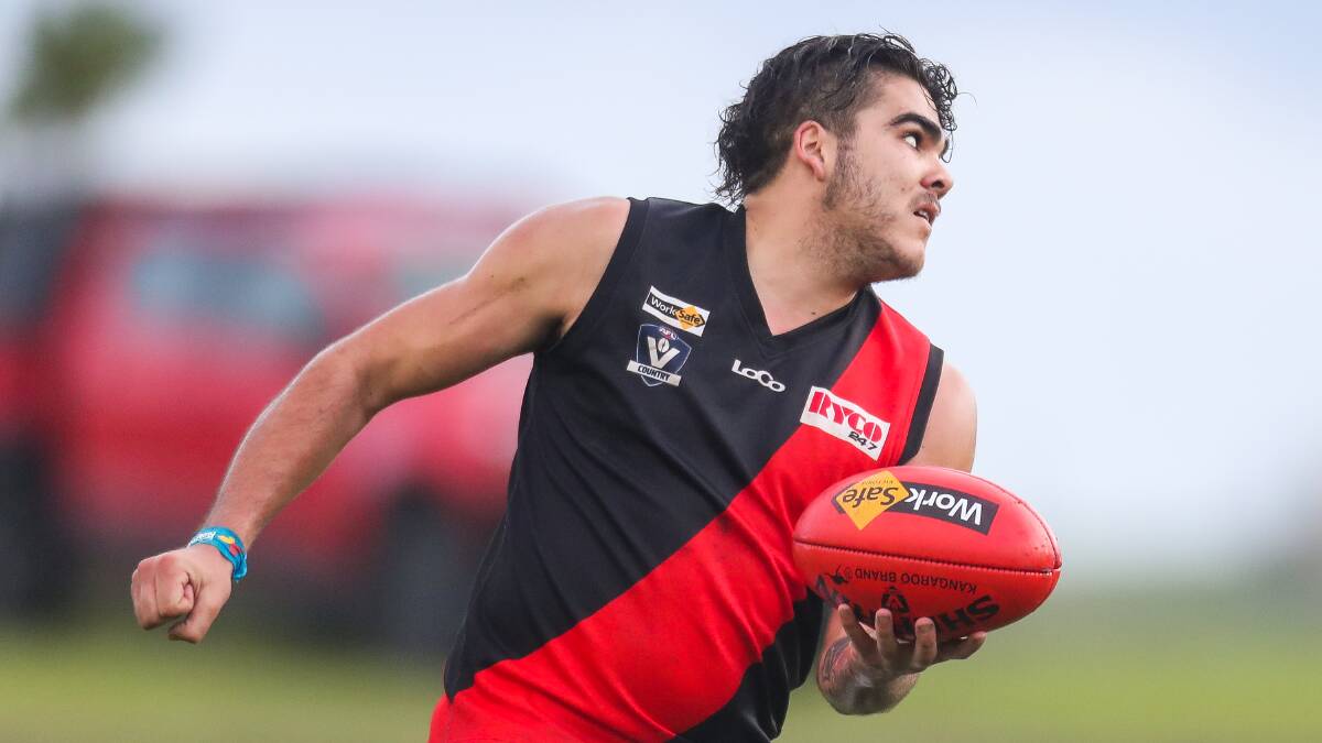 FLYING HIGH: East Warrnambool's Phillip Chatfield was a driving force in the Bombers' midfield. Picture: Morgan Hancock