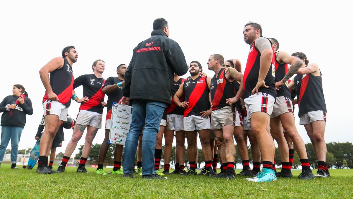 ENJOY IT, BOYS: East Warrnambool players after their win against Dennington on Saturday. Picture: Morgan Hancock