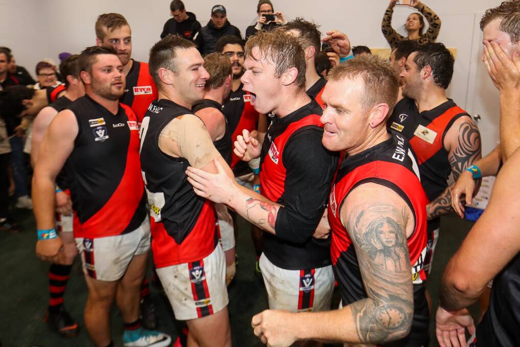 At long last: Ecstatic East Warrnambool players celebrate their win over Dennington. Picture: Morgan Hancock