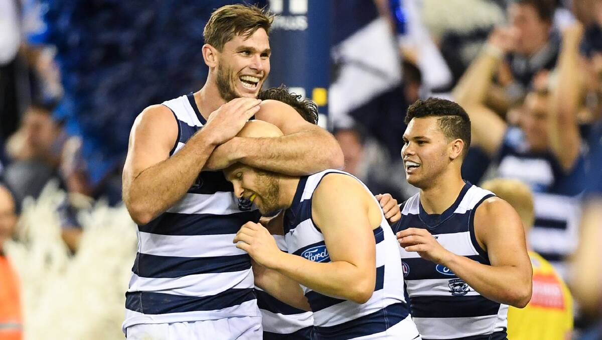 IN FORM: Geelong's Tom Hawkins and Gary Ablett celebrate a goal. Picture: Morgan Hancock