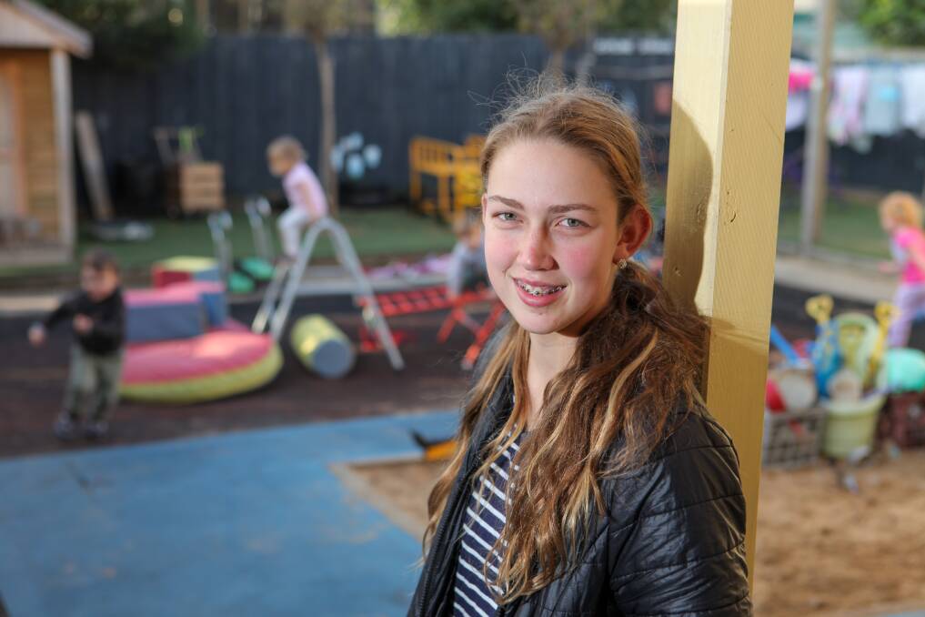 Fresh outlook: 16 year old Maggie Hintum has been volunteering at Honeypot Childcare Centre for 12 months. Picture: Rob Gunstone