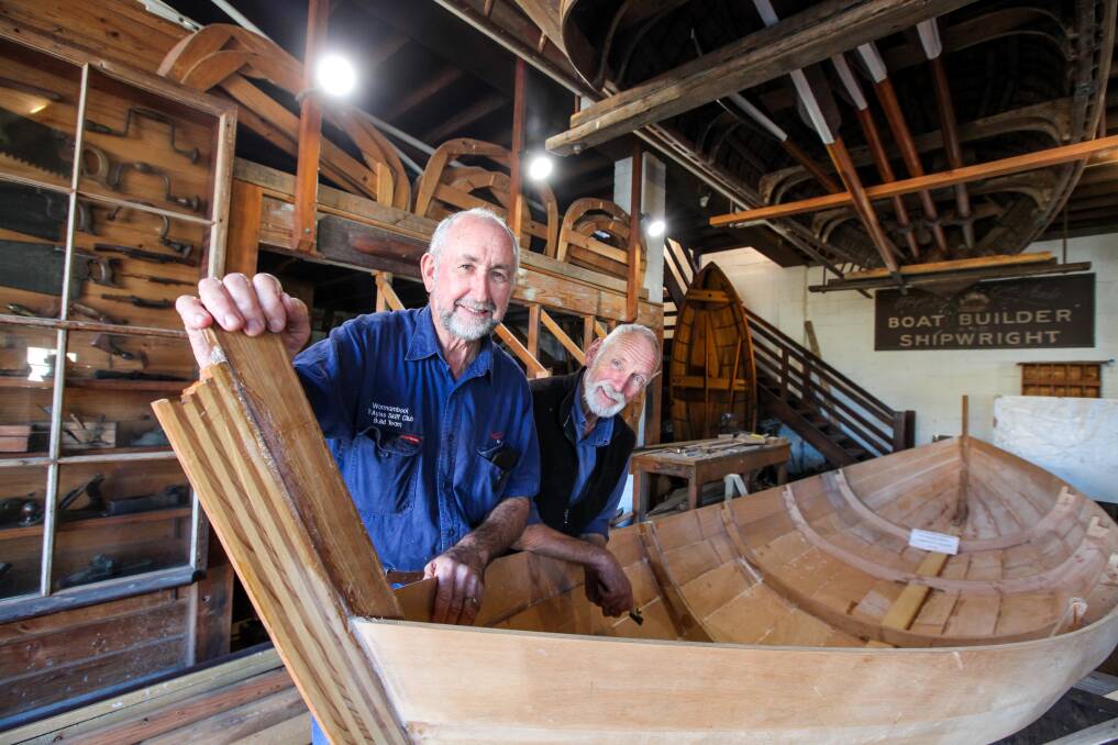 Hands On deck: St Ayles Skiff Community Rowing Club members Pat Shanahan and Gray Wilson have been helping to build a new boat for the group at Flagstaff Hill. Picture: Rob Gunstone
