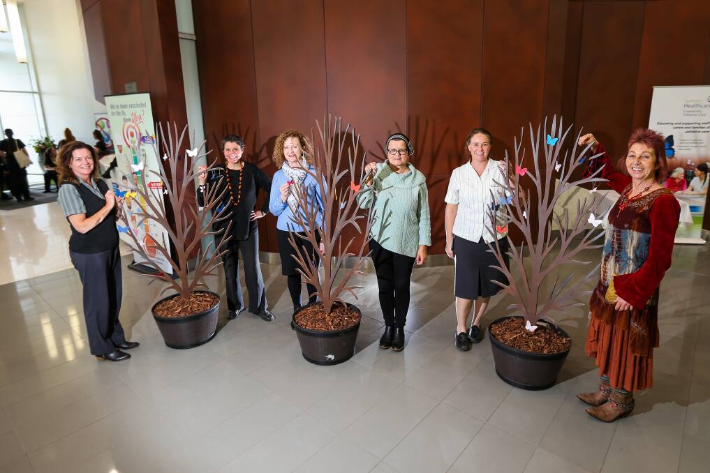 Butterfly tree: Maria Allen, Community palliative care administration support officer, Dr Emma Greenwood, South West Healthcare palliative care director, Bernadette Wurlod, Community palliative care counsellor, Nives, Pauline McCaul, Community palliative care clinical nurse consultant and Jullie Evena, Volunteer services coordinator. Picture: Morgan Hancock