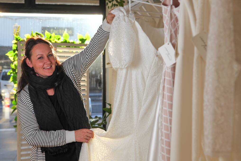 EXQUISITE: Warrnambool Bridal Expo organiser Jess Griffey with some of the dress options from Ivory Bride that will be on display. Picture: Rob Gunstone