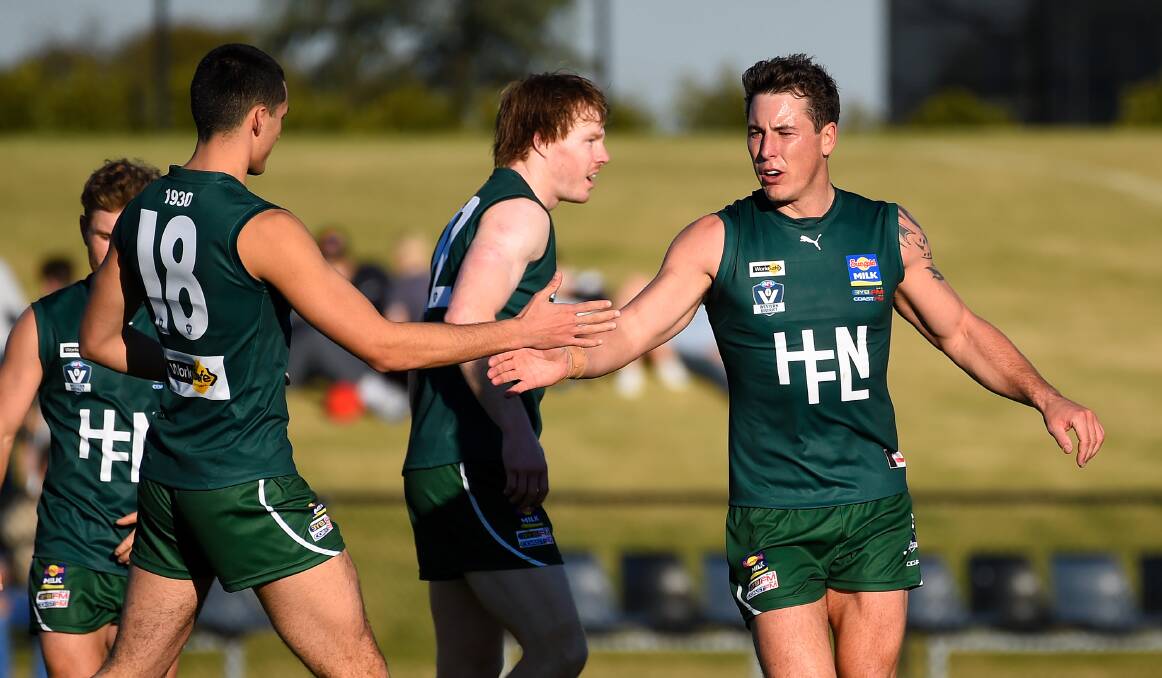 TEAMING UP: Hampden league captain Sam Cowling (right) celebrates a goal with Jarrod Korewha. The pair would only get to play with each other in interleague. Picture: Adam Trafford/Ballarat Courier