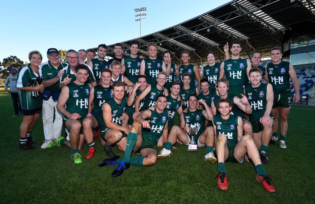 Hampden players celebrate during after defeating Ballarat FNL in May.