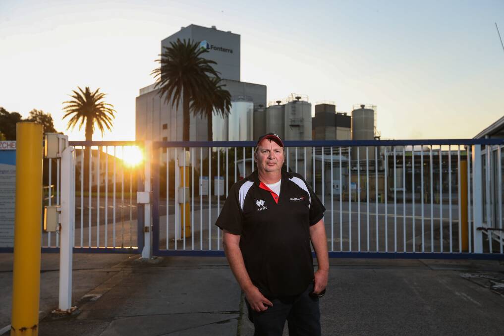 DARK DAY: Tony Hynds, AMWU organiser, stands out the front of the Dennington Fonterra factory. Staff today found out that they are set to lose their jobs when Fonterra shuts its doors in November. Picture: Morgan Hancock