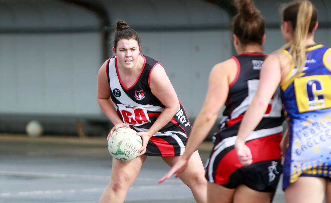 LOOKING OUT: Koroit's Rachel Dobson looks to move the ball forward. Picture: Anthony Brady
