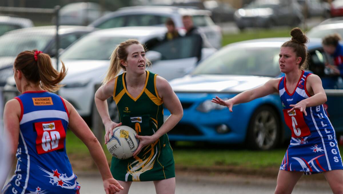 Crowd capacity?: Spectators watch on as Old Collegians centre Rachel Alderson looks for options in 2019. Picture: Anthony Brady