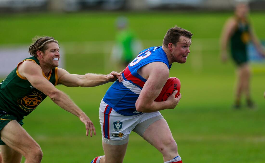 Back for more: Re-signed Panmure coach Chris Bant marks against Old Collegians in 2019. Picture: Anthony Brady