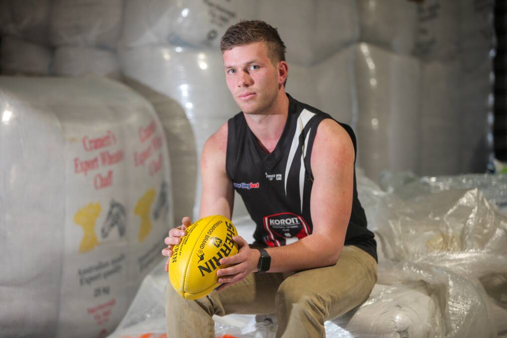 JUGGLING ACT: Young Koroit player George Serra, 19, combines football with his job at Bade and Ness Rural in Warrnambool. Picture: Rob Gunstone