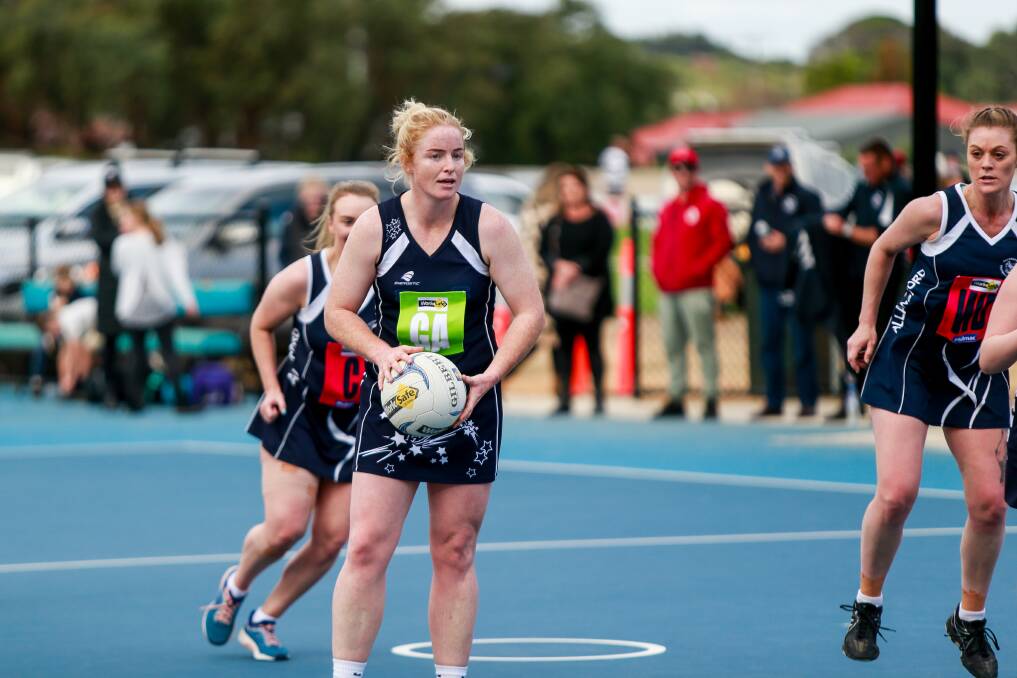 On the attack: Nirranda playing coach Steph Townsend during her team's match against Allansford. Picture: Anthony Brady