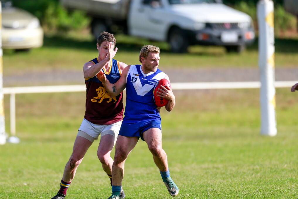 Close attention: Russells Creek onballer Andy McMeel fought hard against South Rovers. during the Russells Creek. Picture: Anthony Brady