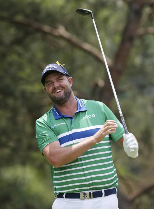 Not bad: Warrnambool's Marc Leishman reacts to his tee shot on the second hole during the final round of the Memorial golf tournament on Sunday in Dublin, Ohio. Picture: AP Photo/Jay LaPrete