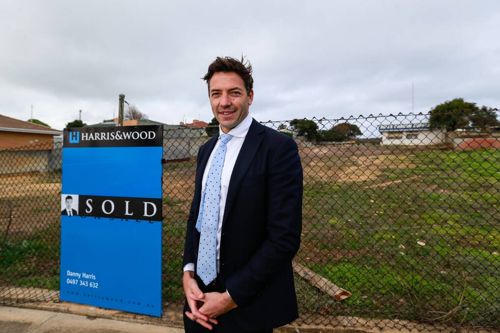 SOLD: Real Estate agent Danny Harris at the old Bell's Garden Supplies site that has been sold and is proposed to become a childcare centre. Picture: Anthony Brady