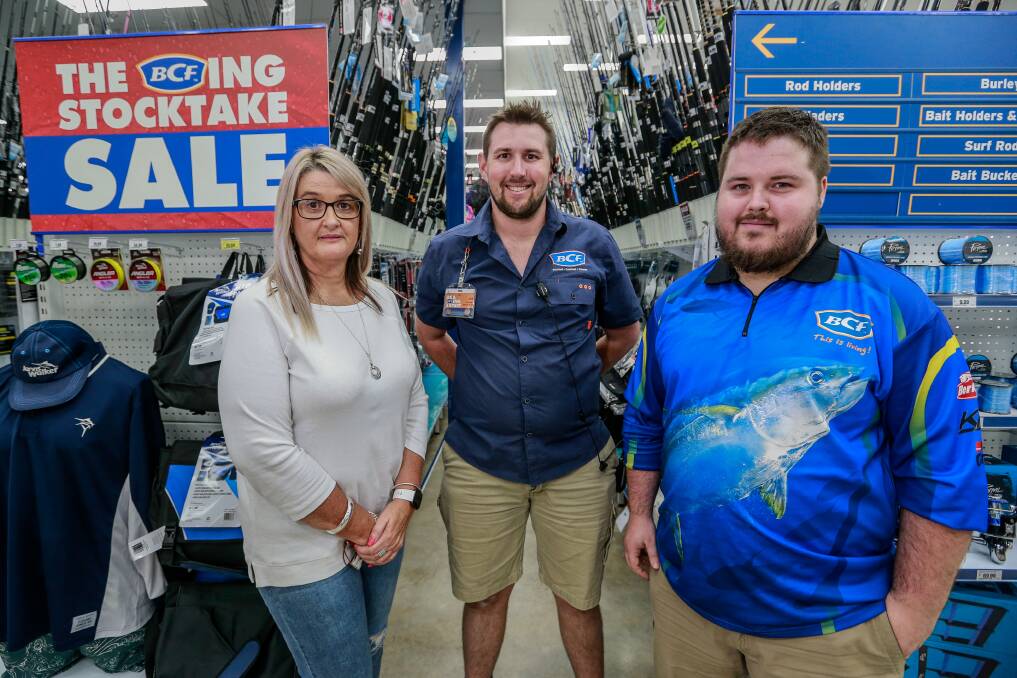 ALL-ABILITY STAFF: Riley Malone (right) with BCF manager Josh Kirkness and his mother Karen Bell. Riley is among hundreds of people with disability who have started Warrnambool jobs. Picture: Anthony Brady.