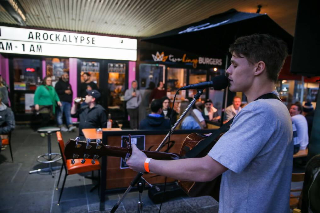 Farewell: Blake Rudley-Castles keeps punters entertained outside The Loft during the Arockalypse gig - the venue's last before closing. Picture: Rob Gunstone