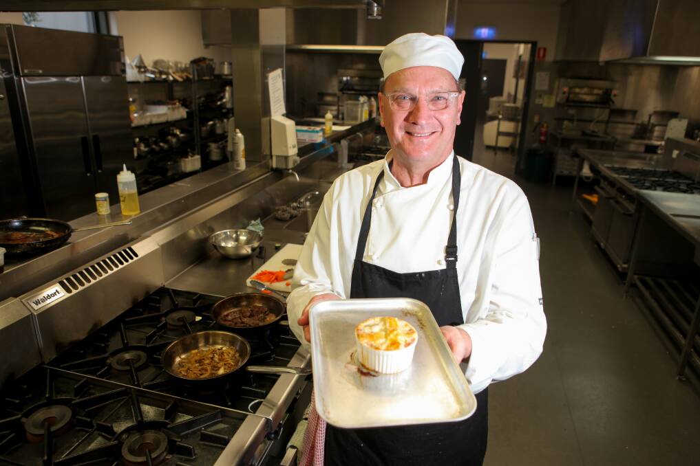 LIFELONG LEARNING: Trainee chef Stephen Rudolph shows off a turkey and kangaroo pie. Picture: Rob Gunstone