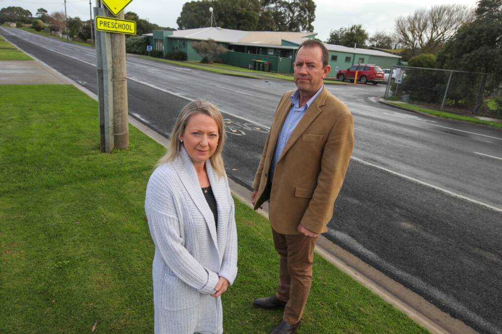 SLOW DOWN: Allansford mum Renae Blake and primary school principal Wes Allen want better signage and reduced speed limits along Ziegler Parade. Picture: Rob Gunstone