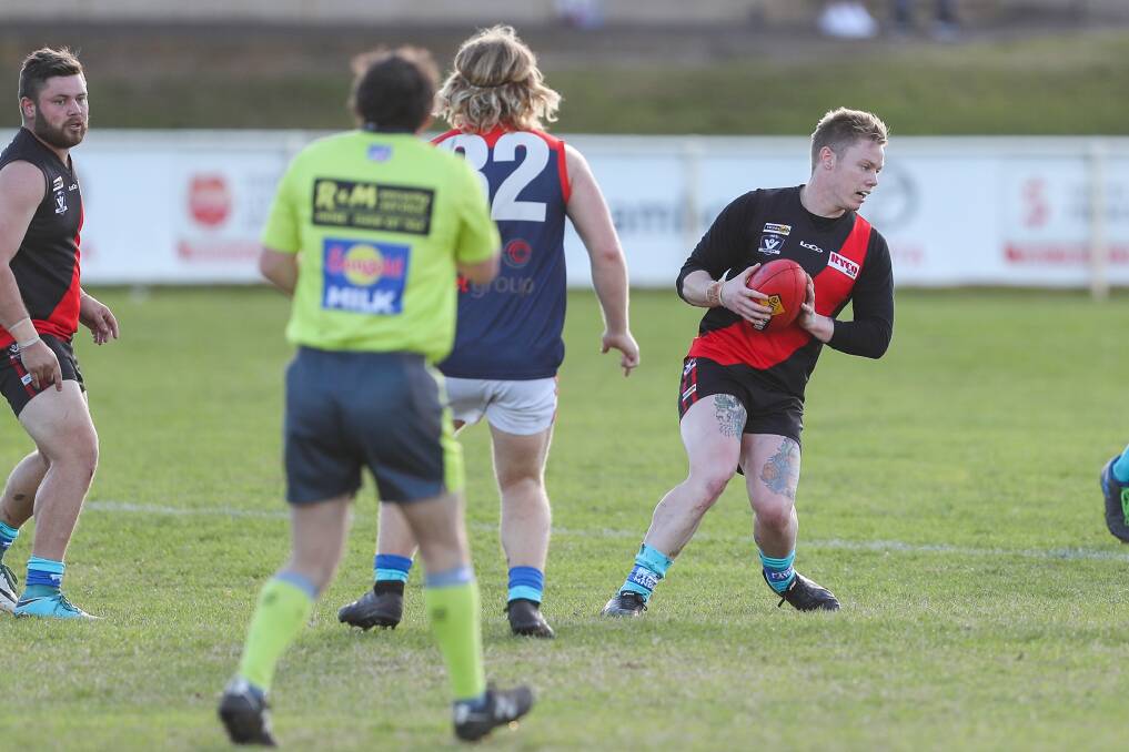 LEADER: East Warrnambool's Bradley Rees in action against Timboon Demons at Reid Oval on Saturday. Picture: Morgan Hancock