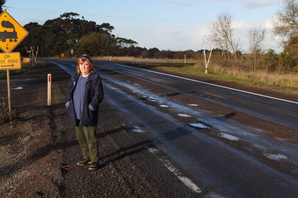 CONCERNED: Garvoc resident Sheryl Thomas isn't happy with state of Princes Highway works, which have been left incomplete due to winter weather. Picture: Morgan Hancock