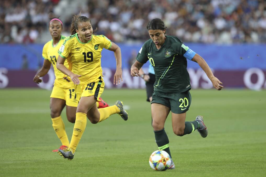 On fire: Australia's Sam Kerr scores her side's opening goal during the Women's World Cup Group C soccer match against Jamaica. She finished with four goals.
