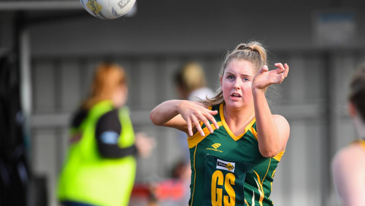 READY TO GO: Old Collegians' Chelsea Quinn watches the ball after she passes it. Picture: Morgan Hancock