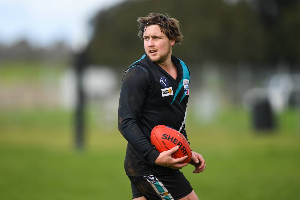 Eyes over shoulder: Kolora-Noorat's Mark Clissold returns to play Nirranda. The Power are ready to take on the Blues. Picture: Morgan Hancock
