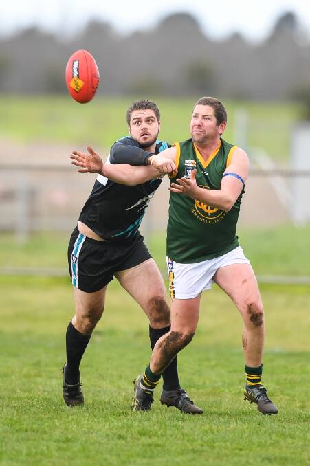 Day out: Old Collegians' Michael Darmody leads in front for the ball. He had a day out against East Warrnambool. Picture: Morgan Hancock