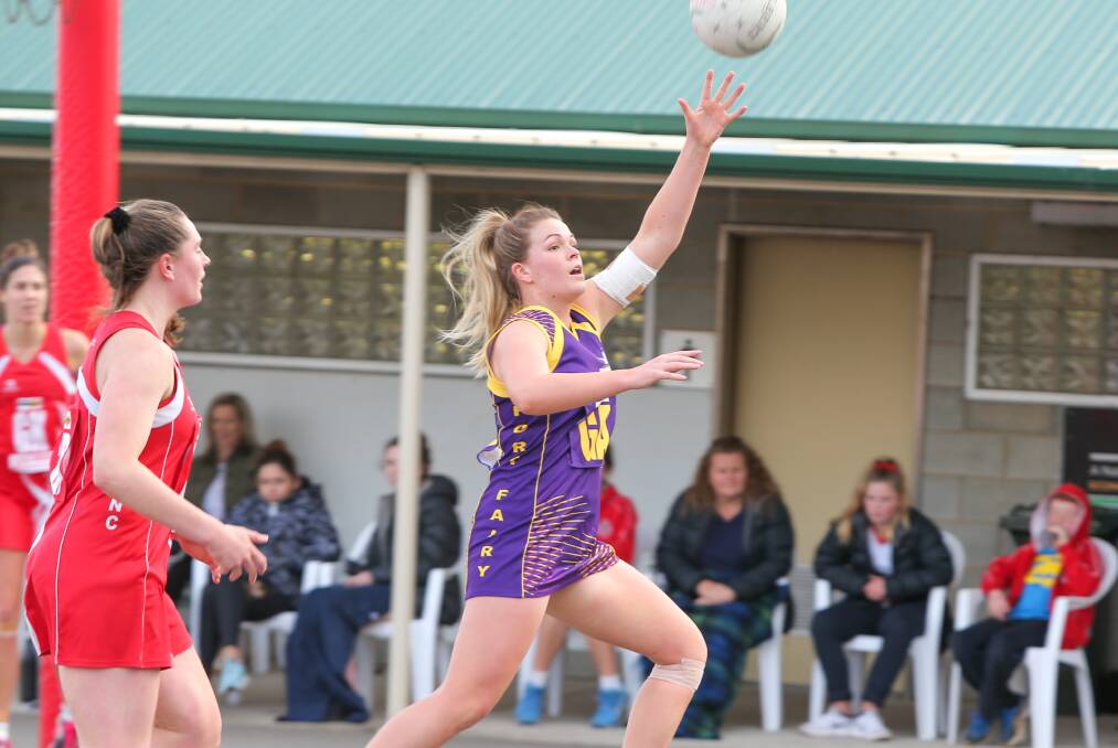STAR EFFORT: Port Fairy's Chelsea McMahon jumps to try and gather the ball. Picture: Rob Gunstone