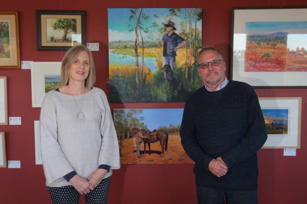 President Judy Rauert and vice president Tim Walker at the latest exhibition by Warrnambool and District Artists Society. Picture: Mark Witte